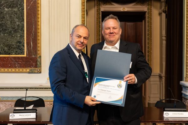 Joel Elsenbroek meeting with John Ladd, Administrator of the department’s Office of Apprenticeship.